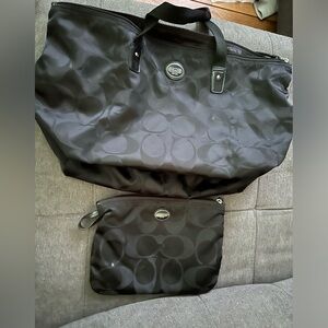 Black Coach bag with removable Coach insert
